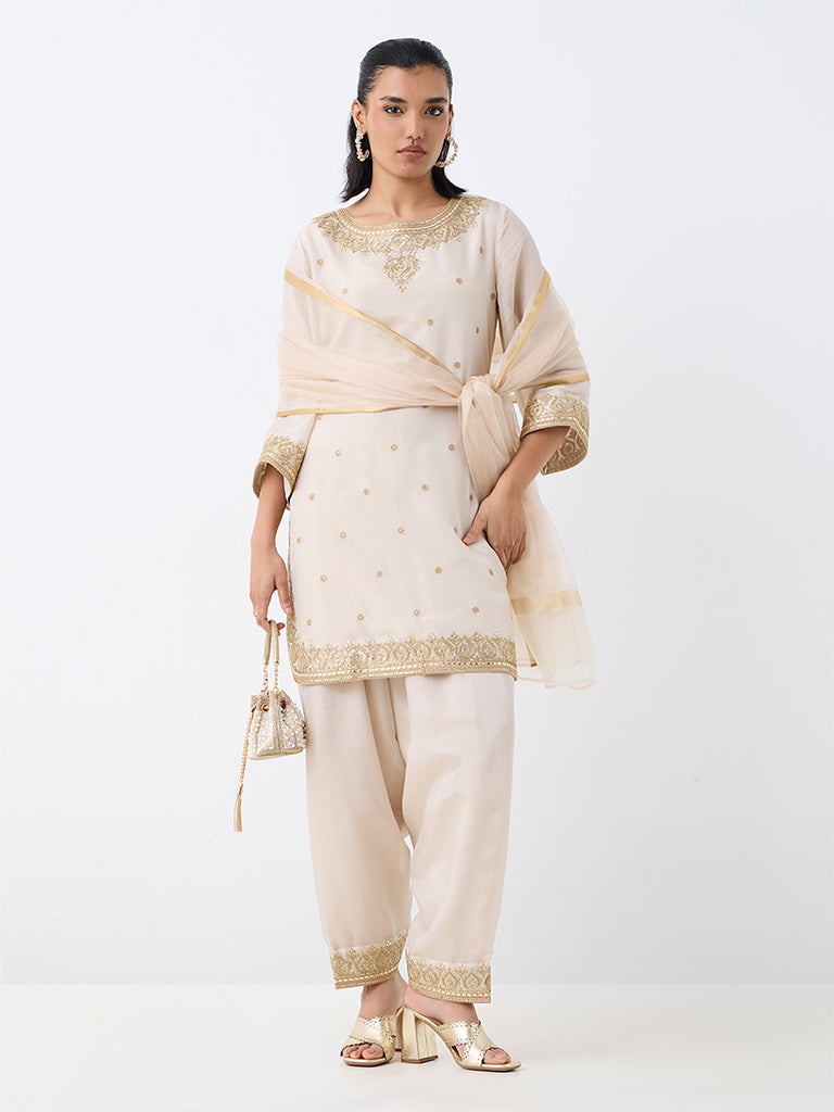 Off-White Floral Embellished A-Line Kurta And Salwar Set — photo 1